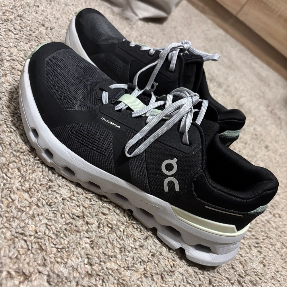 On Running Black and White Athletic Shoes